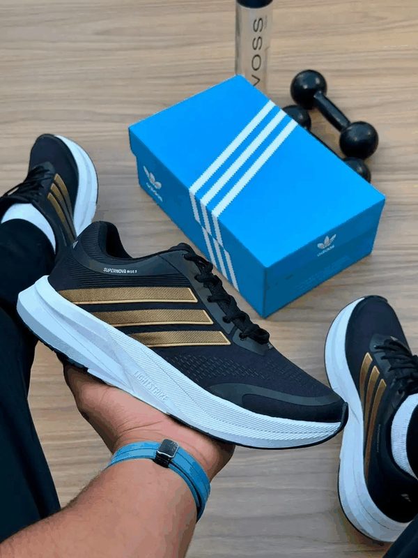 ADIDAS SUPERNOVA RISE 3 - PTO/OURO/BCO
