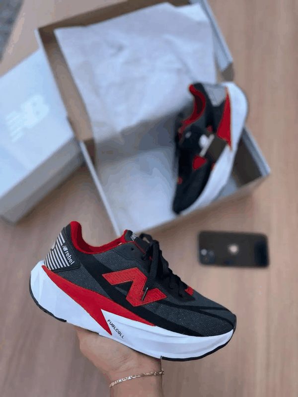 NEW BALANCE REBEL II - PTO/VERMELHO/BCO